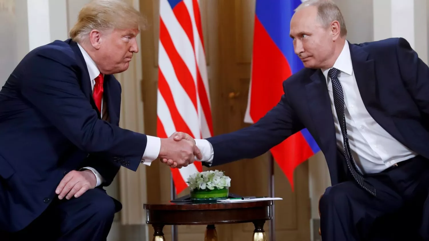 Donald Trump and Vladimir Putin, Finland, July 16, 2018. AP Photo/Pablo Martinez Monsivais