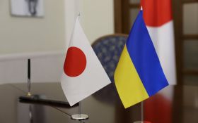 Государственные флаги Японии и Украины. Фото: dpsu.gov.ua