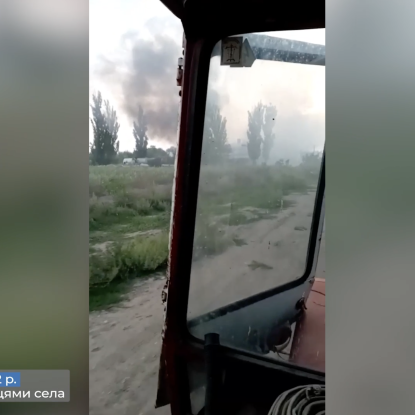 One of the men's visits to the site of the attack in Kotlyarevo. Screenshot from the video