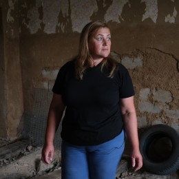 Lyudmila Menshova shows her house, which was flooded due to the explosion of the Kakhovskaya HPP. Photo: «NykVesty"