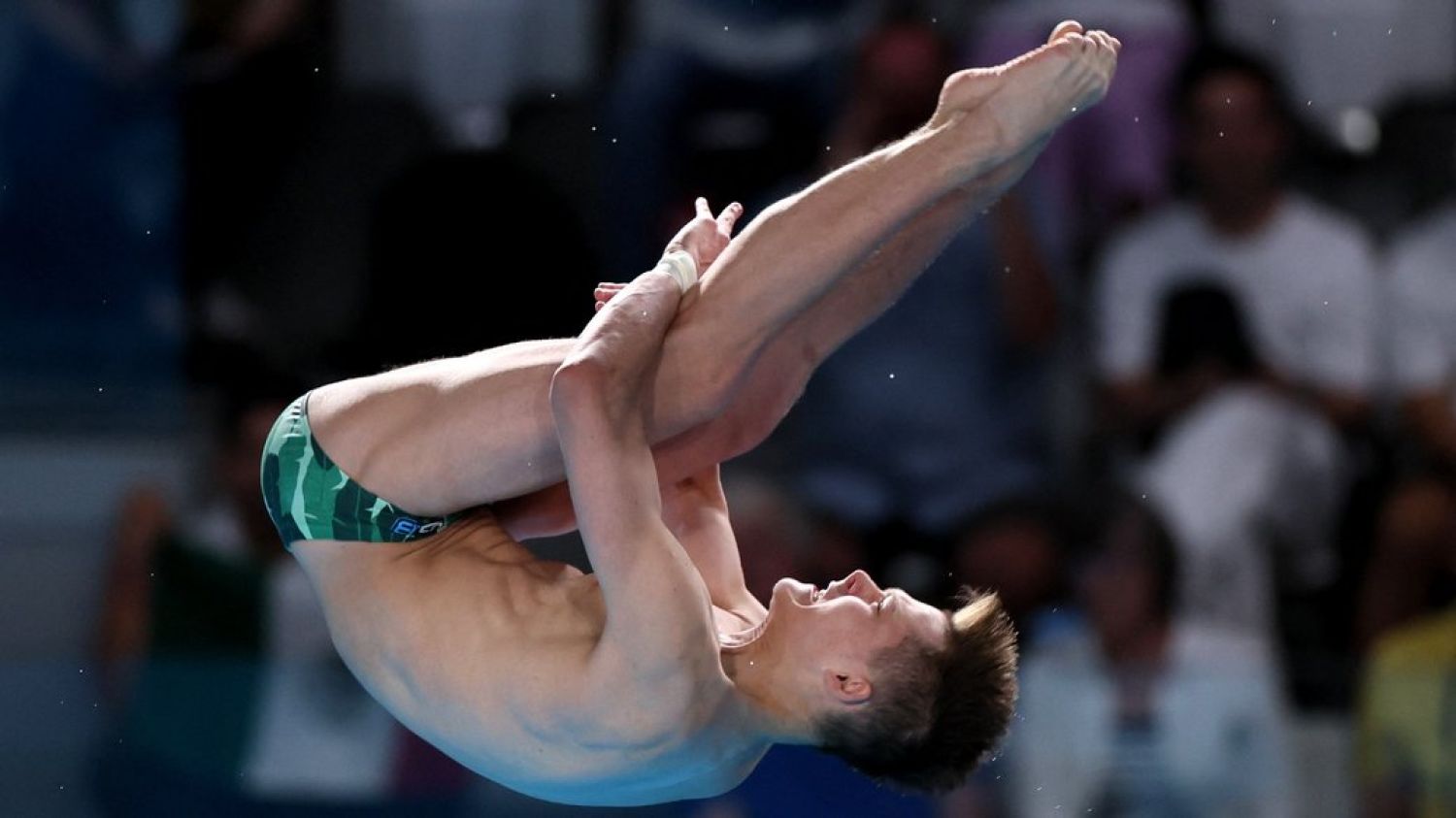 Oleksiy Sereda performs a jump in the final of the Olympics, photo: REUTERS