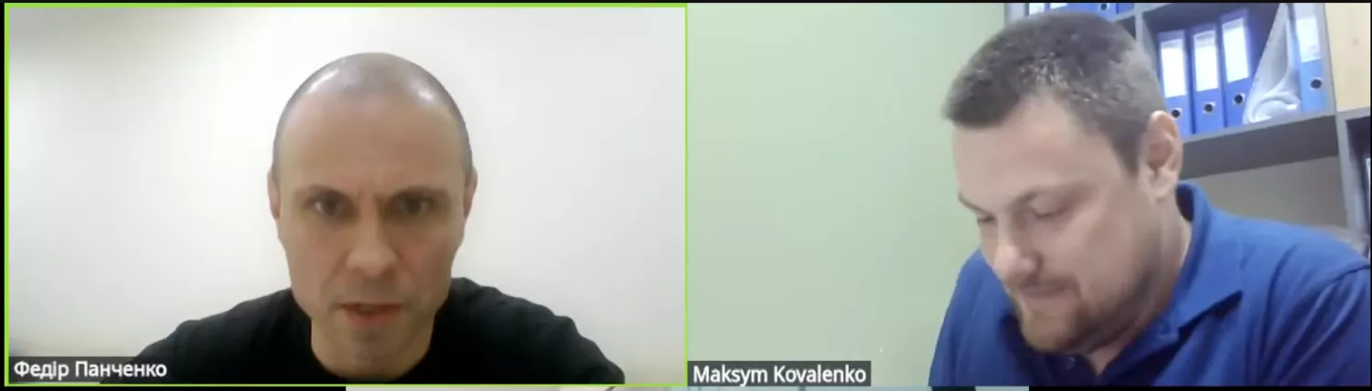 Депутати Федір панченко та Максим Коваленко під час сесії, скриншот прямої трансляції міської ради