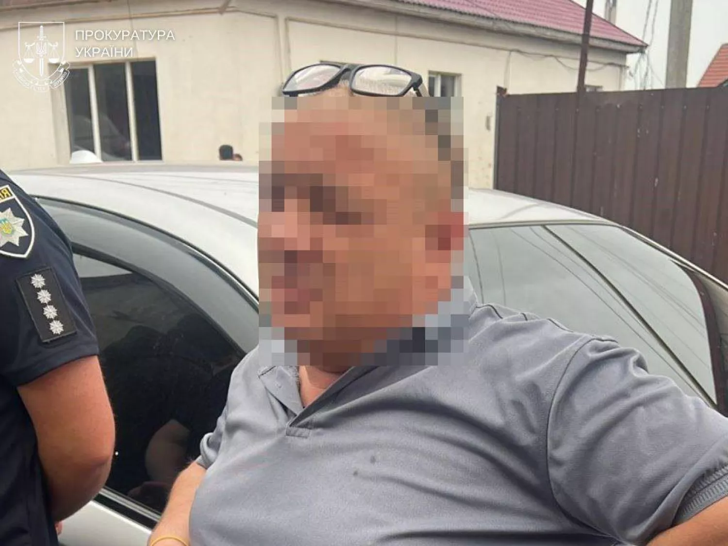 Затримання шахраїв, фото Одеської обласної прокуратури