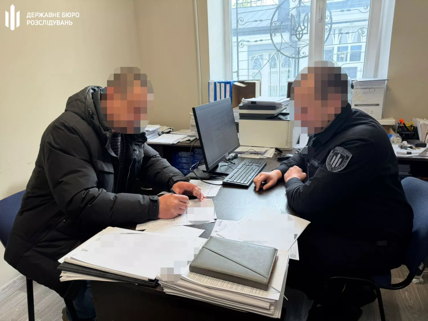 Працівників ТЦК на Миколаївщині підозрюють у втручанні в систему «Оберіг». Фото: Державне бюро розслідувань